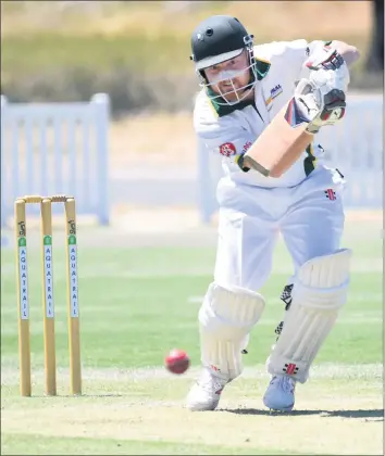  ??  ?? RUNS THERE: West Wimmera’s Mitch Dahlenburg punches a ball through the off-side during a Horsham Cricket Associatio­n clash against Horsham Saints.
Picture: PAUL CARRACHER