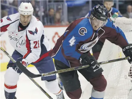  ??  ?? Colorado defenceman Tyson Barrie, right, who is a candidate to be traded this off-season, is among the league’s top 10 attacking defencemen as measured by offensive metrics. David Zalubowski/The Associated Press