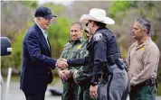  ?? Evan Vucci/Associated Press ?? President Joe Biden talks with U.S. Border Patrol and local officials on Feb. 29 in Brownsvill­e.