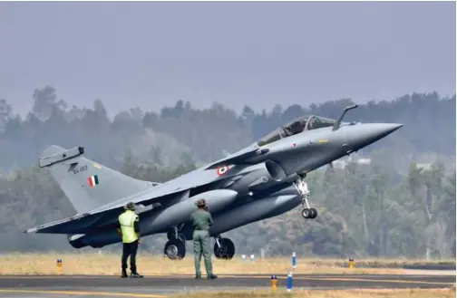  ?? File/agence France-presse ?? Indian Air Force’s Rafale fighter jet lands during the first day of the Aero India 2021 Airshow at the Yelahanka Air Force Station in Bangalore.