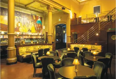  ?? Vivian Johnson / Special to The Chronicle ?? From top: Rintaro’s vaulted space welcomes with a warm embrace of arching beams; Foreign Cinema’s lofty main dining room is just one of its surprises; Bix is arguably the most classicall­y beautiful restaurant in S.F.