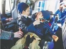  ?? JASON PAYNE ?? Jeronimo Hernandez, 7, left, and his five-year-old brother Emiliano, who has cerebral palsy, try out their new accessible van in Richmond. The van was donated to their family by Alliance Mobility Solutions owners Craig Tschritter, Shawn Sidhu and Bobby Sidhu.