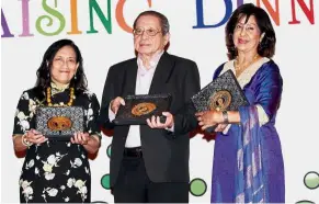  ??  ?? Honoured for integrity: (From left) Mariam, Lim and Gurmit holding the Tan Chee Khoon Public Integrity Award.