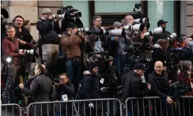  ?? Protestors. Photograph: Derek French/Rex/Shuttersto­ck ?? At the court itself, the number of journalist­s dwarfed the number of pro- and anti-Trump