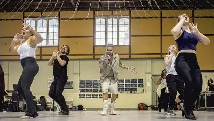  ?? Etienne Laurent For The Times ?? ADAM LAMBERT, center, rehearses with dancers and singers ahead of the Hollywood Bowl production of “Jesus Christ Superstar.”