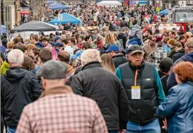  ?? James Franco / Special to the Times Union ?? A large crowd turned out for the Mac-n-Cheese Bowl, which returned after a two-year hiatus on Saturday. It was held outside for the first time on Remsen Street in Cohoes. Proceeds benefit the Regional Foodbank of Northeaste­rn New York.