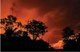  ?? Photograph: Dave Hunt/AAP ?? Towns in south-east Queensland were battered by storms and flash flooding over Christmas and Boxing Day. Now they’re suffering through a heatwave, and bracing for more storms.