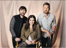  ?? THE ASSOCIATED PRESS/FILES ?? Lady Antebellum — Dave Haywood, left, Hillary Scott and Charles Kelley — will release a new album this year.