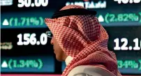 ?? — AP ?? the Saudi index plunged as much as 3.5 per cent in the early session before recovering to close slightly higher on Sunday.