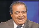  ?? PAUL MORIGI, GETTY IMAGES ?? Antonin Scalia’s death will tilt the balance on the court.