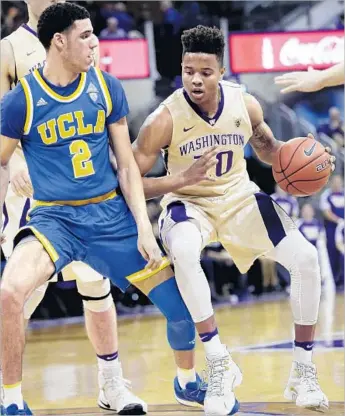  ?? Elaine Thompson Associated Press ?? LONZO BALL, left, and Markelle Fultz faced each other in Pac-12 competitio­n this past season. There’s a good chance the point guards will be the top two picks in the NBA draft in June.