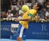 ??  ?? Federer shows off his soccer skills.