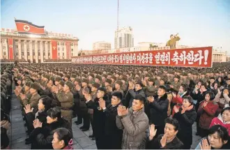  ?? KIM WON- JIN, AFP/ GETTY IMAGES ?? North Koreans attend a mass rally in Kim Il- Sung Square in Pyongyang to celebrate the country’s claim that it had achieved full nuclear statehood on Dec. 1.