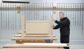  ?? MATHEW MCCARTHY WATERLOO REGION RECORD ?? Ryan Korczak, above and below, works on a project at the Woodworkin­g Centre at Conestoga College.