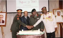  ??  ?? KUWAIT: Brigadier Ghazi Al-Shammari, Brigadier Mohammad Nasim Al-Ghani and other officials cut the ceremony’s cake. — Photos by Joseph Shagra