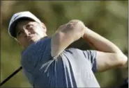  ?? GREGORY BULL — THE ASSOCIATED PRESS ?? Alex Noren, of Sweden, watches his tee shot on the 14th hole of the South Course at Torrey Pines Golf Course during the third round of the Farmers Insurance Open golf tournament, Saturday in San Diego.