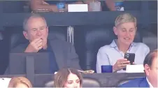  ?? FOX/NFL ?? George W. Bush, left, and Ellen Degeneres watched the NFL’S Green Bay Packers take on Dallas Sunday from the Cowboys’ owner’s suite.