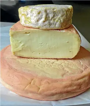  ?? EWAN SARGENT/STUFF ?? Washed rind cheeses, from top to bottom, Cranky Goat’s Cullensvil­le Gold; taleggio from Italy; and Thorvald’s Devotion.