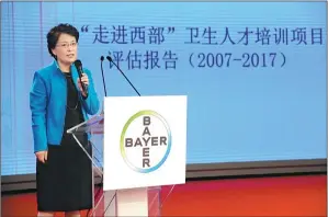  ?? Photos provided to china Daily ?? Zhao Kun, vice-chairwoman of the China Health Economics Associatio­n, gives an overview of key achievemen­ts of the Go West Project over the past 10 years.