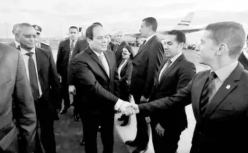  ??  ?? Egypt’s President Abdel Fattah al-Sisi is received on his arrival at the Bole Internatio­nal Airport ahead of the 28th Ordinary Session of the Assembly of the Heads of State and the Government of the African Union in Ethiopia’s capital Addis Ababa. —...