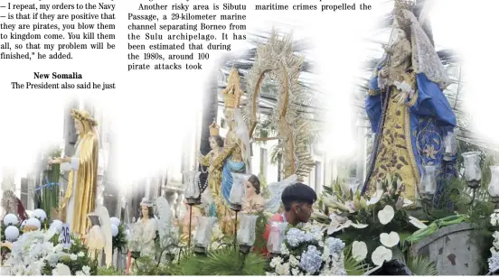  ?? BOB DUNGO JR.@tribunephl_bob ?? Holy Mother’s journey Contrastin­g images of the Virgin Mary were on parade in Intramuros, Manila for the annual Grand Marian Procession that happens every first Sunday of December.