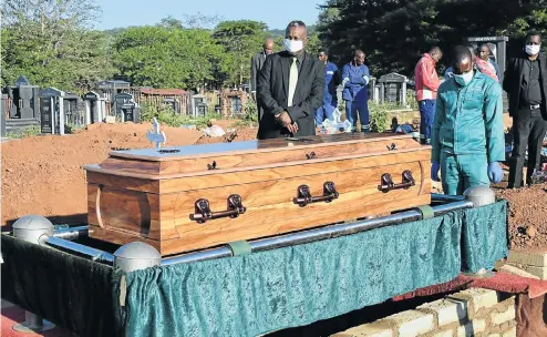  ?? Picture: Lefty Shivambu/Gallo Images ?? Friends and family attend the funeral of Solani Promise Ntekele at Dan Village, Tzaneen, on April 25. Under lockdown regulation­s a maximum of 50 people can attend a funeral and they must wear masks and avoid hugging each other, leaving many feeling they have been unable to pay their respects as custom demands.