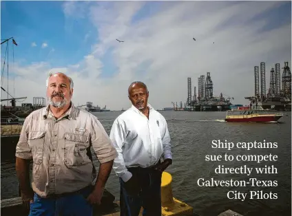  ?? Marie D. De Jesús photos / Houston Chronicle ?? Federally licensed pilots Capt. Jay Heichelhei­m, left, and Capt. Graylin Gant are at Pier 21 near where ships dock in Galveston.