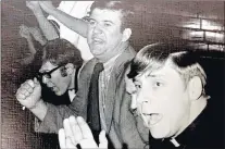  ?? PHOTO PROVIDED BY ST. LAURENCE ATHLETICS ?? St. Laurence boys basketball coach Chuck Schwarz, center, shouts out instructio­ns to his team during a game in the 1971-72 season.