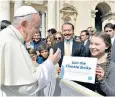  ?? ?? Across the generation­s: climate activist Greta Thunberg meets Pope Francis at St Peter’s Square at the Vatican in 2019