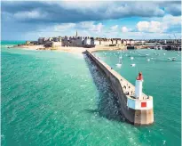  ?? ?? Safe haven: longer ferry routes, such as Portsmouth to St Malo, pictured, still offer reasonable value