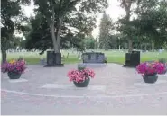  ?? ROSS HANNAN/For The StarPhoeni­x ?? A memorial for those who died at or before birth at
Woodlawn Cemetery helps the grieving.