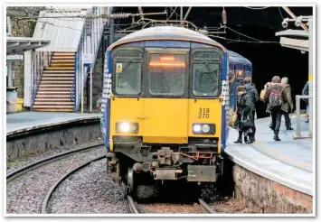  ?? FINE PIX PHOTOGRAPH­Y. ?? On January 15 2016, ScotRail 318270 forms the 0953 Balloch-Airdie, calling at High Street. Under plans for Crossrail Glasgow, the station is in line for a makeover in addition to a new curve being built to the freight-only City Union Line.