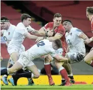  ?? Picture: REBECCA NADEN/REUTERS ?? TOUGH CALL: Wales’ George North is tackled by England’s Owen Farrell in the Six Nations Championsh­ip match at the Principali­ty Stadium in Cardiff on Saturday