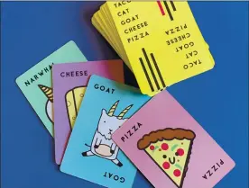  ??  ?? Woe betide the player who gets the “Taco Cat Goat Cheese Pizza” calls out of order in this fun, slap-happy card game.