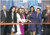  ?? Liz Hafalia / The Chronicle ?? Transit Joint Powers Authority, city and state officials were on hand to cut the ribbon to open the Transbay Transit Center on Friday.