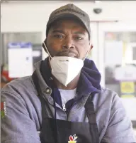  ?? H John Voorhees III / Hearst Connecticu­t Media ?? Brian Simmons, who works at the Newtown Stop & Shop, is one of the many grocery workers in the state who have continued to go to work amid a pandemic, despite risks to their health.