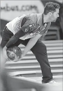  ?? [JOSHUA A. BICKEL/DISPATCH] ?? Jason Belmonte bowls during qualifying Thursday at Wayne Webb’s Columbus Bowl. His PBA-record 244.57 average over 30 games this week put him in the top spot for Sunday’s stepladder finals.