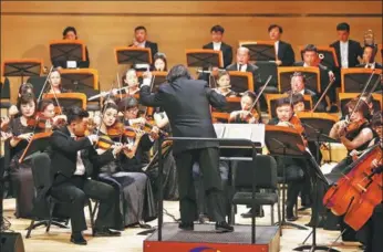  ?? PHOTOS PROVIDED TO CHINA DAILY ?? The Tianjin Symphony Orchestra will perform under the baton of conductor Tang Muhai during a tour launched by the Silk Road Internatio­nal League of Theaters.