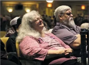  ?? The Associated Press ?? MEMORIAL: Susan Bro, mother to Heather Heyer, becomes emotional during a memorial for her daughter on Wednesday at the Paramount Theater in Charlottes­ville, Va. Heyer was killed Saturday, when a car rammed into a crowd of people protesting a white...