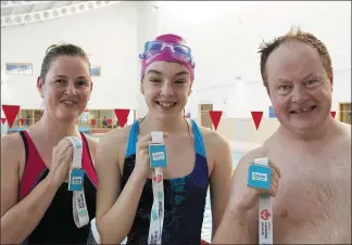  ??  ?? Swimmers enjoying the Swim A Mile challenge in the Apex recently.