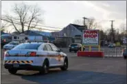  ?? MARIAN DENNIS — DIGITAL FIRST MEDIA ?? State Police were at Capitol Cash Exchange in West Pottsgrove nearly all day while executing a search warrant to look for stolen items.