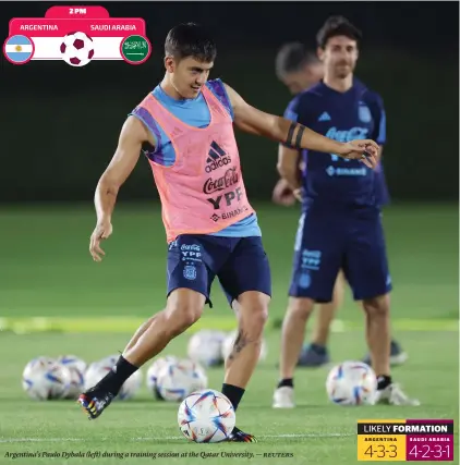  ?? — reuters ?? Argentina’s Paulo Dybala (left) during a training session at the Qatar University.