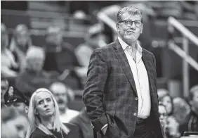  ?? THE ASSOCIATED PRESS ?? Connecticu­t women’s basketball coach Geno Auriemma winces during the second of an exhibition game against Fort Hays on Wednesday in Hartford, Conn. The Huskies won 82-37. UConn is No. 1 in the AP preseason rankings.