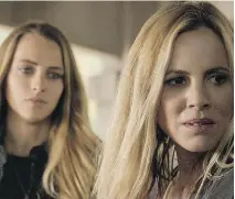  ?? WARNER BROS. PICTURES ?? Teresa Palmer, left, and Maria Bello star in Lights Out, which is a little lean for a feature film despite an excellent premise.