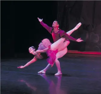  ??  ?? Sugar Plum Fairy Hannah Wilcox and Cavalier Raydel Caceres perform their duet in “The Nutcracker” at the College of the Canyons Performing Arts Center on Wednesday. Wednesday’s show, featuring dancers from the Santa Clarita Ballet Company, was...