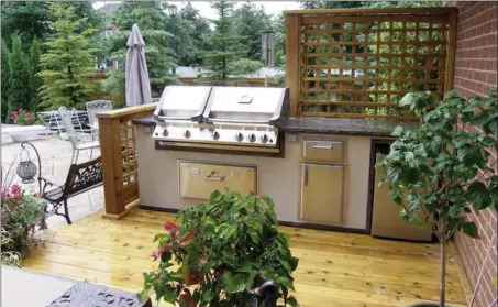  ??  ?? This custom-built kitchen has become the new heart of a happy homeowner’s home.