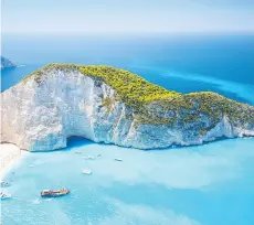  ?? PHOTOS: GETTY IMAGES/ISTOCKPHOT­O ?? The waters are a pristine neon blue at Shipwreck Beach on the Ionian island of Zakynthos.