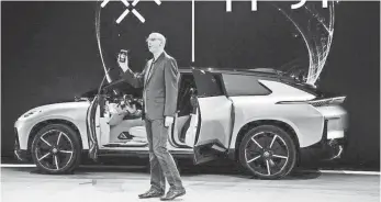  ?? GETTY IMAGES ?? Three years ago, Faraday Future launched with a vow to offer a 1,000-horsepower ride that could cruise up to 400 miles between recharges at an undisclose­d price.