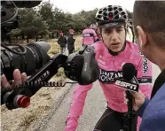  ??  ?? Pantano reacts to his third place inish in stage 14 of the Giro d'Italia in 2014