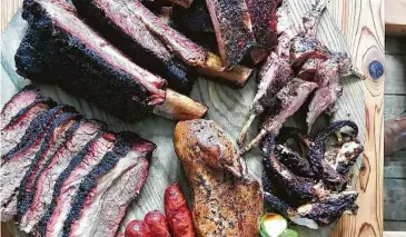  ?? Greg Morago / Staff ?? Smoked barbecue platter at Harlem Road Texas BBQ